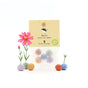 5 flower marbles in a "Happy Birthday" bag