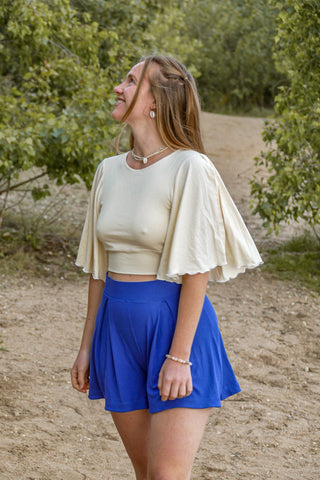 Muschelweißes Damen-Oberteil mit Schmetterlingsärmeln