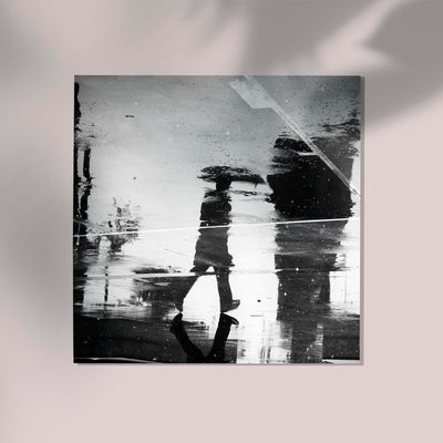 Man's reflection on a wet street Poster - Black and White Photography