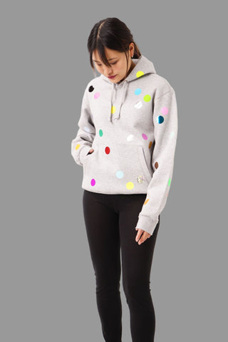 Unisex Hoody mit handgedruckten Multifoil‑Punkten (Glow, Glitter, Holo, matt, shiny, reflektierend), relaxed Fit, Kängurutasche und warmem Sweat.
