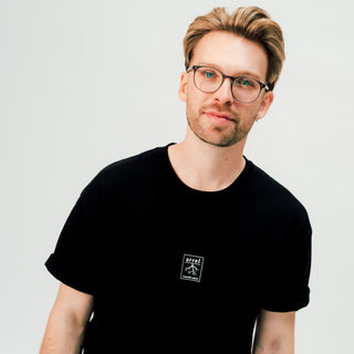 don't be racist unisex oversized t-Shirt für Männer in schwarz mit arrel logo