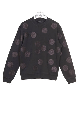 Unisex Sweater mit großen Glitzerpunkten allover; weicher, warmer Sweat, flexibler Glitter‑Print, festlicher Look mit pflegeleichten Hinweisen zur Handwäsche.
