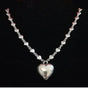 Traditional necklace “Herzerl” – heart pendant made of rhinestones or polished metal