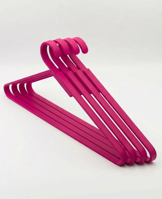 Kleiderbuegel UNIQUE in Pinkmagenta aus massivem Aluminium fuer moderne Flure und Ankleidebereiche